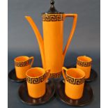 Portmeirion coffee set with Greek key pattern upon an orange ground comprising coffee pot and four