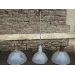 A pair of vintage Mazdalux industrial pendant lights with domed grey enamel shades, and one other