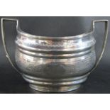 A Georgian two handled silver sugar bowl with engraved floral decoration, London 1802, maker