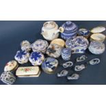 A collection of small Chinese and other porcelain boxes in varying shapes, small open vase, etc