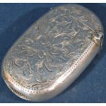 A late Victorian silver vesta case with an all-over foliate engraving, Birmingham 1901, maker
