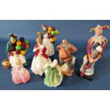 A collection of Doulton ware including The Jester, Falstaff, Two Balloon sellers and three female