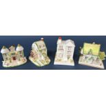 Eight contemporary Coalport china cottages, including 32 Windsor Gardens, London (Paddington Bear'