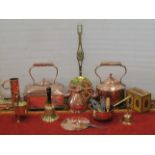A collection of 19th century copper and brass ware, including a milk measure, jug, a large