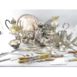A mixed selection of silver plated items including teapots, sauce boat, drinks tray, tankard, jugs