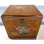 An oriental travelling vanity box with a hinged lid opening to reveal a mirror and a fitted interior