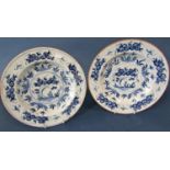 a pair of late 18th century tin glazed plates in a blue and white colourway with painted abstract