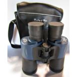 A pair of Dowling & Rowe focus free 7x5 Field angle 6.6 116/1000m binoculars and carry case.
