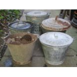 A vintage galvanised egg preserving pail together with four further galvanised pails/brackets of