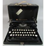 An underwood portable typewriter with handbook and original receipt for £12 Guineas 30/6/1926