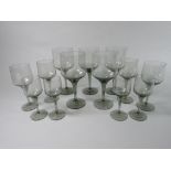 A collection of Orrefors Rhapsody Smoky grey wine glasses, eleven small wines, 17cm tall,