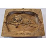 A carved wooden panel depicting a speared dying lion, inscribed Helvetiorum MDCCXCII (1792) after
