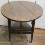 18th century cricket table, mainly in oak and elm, with central wedge shaped drawer, 49cm diameter