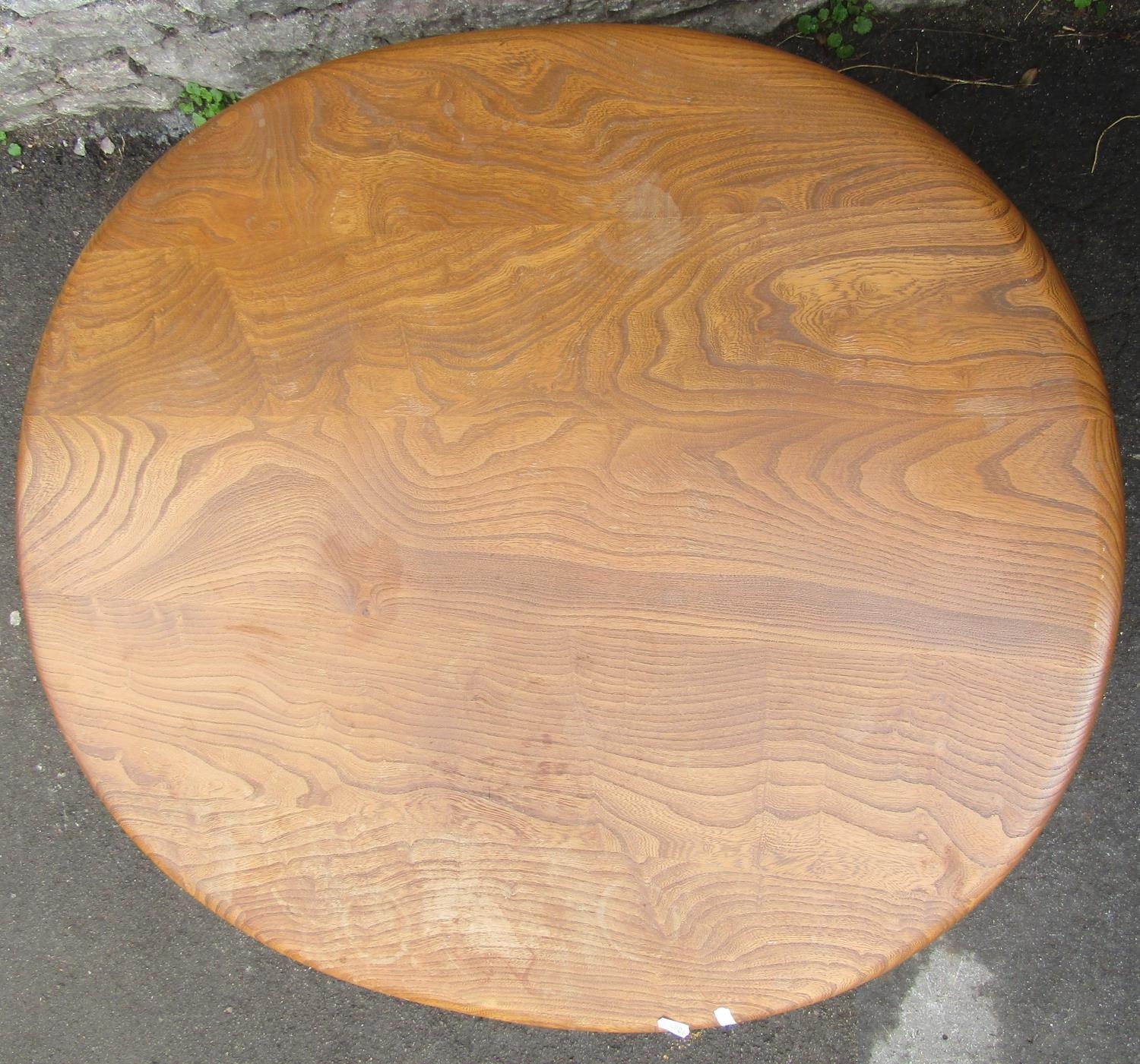 A vintage Ercol elm and beechwood occasional table of oval form raised on simple turned tapered legs - Image 2 of 2