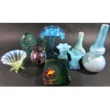 A miscellaneous collection of glassware including opaque vases, jugs, Cranberry ware, fruit bowl,