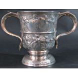 A Georgian floral engraved double handled cup, hallmarks rubbed, 12cm high, 10.5oz approx