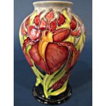 A Moorcroft oviform vase with repeating floral detail marked trial, 18/12/2000