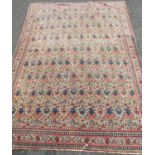 A Persian Qum carpet with a tightly knotted overall floral pattern, 195cm x 142cm approx