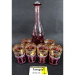 Six Venetian gilded red glass beakers decorated with St Mark’s Square Arches, together with