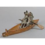 A small cold painted bronze of two cats in an open canoe (af) 10cm approx