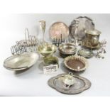 A collection of silver plated toast racks, coasters, tray, bowls , candlestick, etc