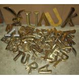 Approximately sixty brass letters together with four wooden examples varying size (possibly ex pub