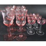 A Murano Art Glass flower head 33cm high, six pink candy stripe Limoncello glasses, six rose pink