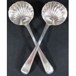 A pair of Georgian sauce spoons with scalloped bowls, London 1820, makers mark rubbed, 17cm