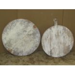 Two vintage circular pine bread boards 50 and 42cm in diameter