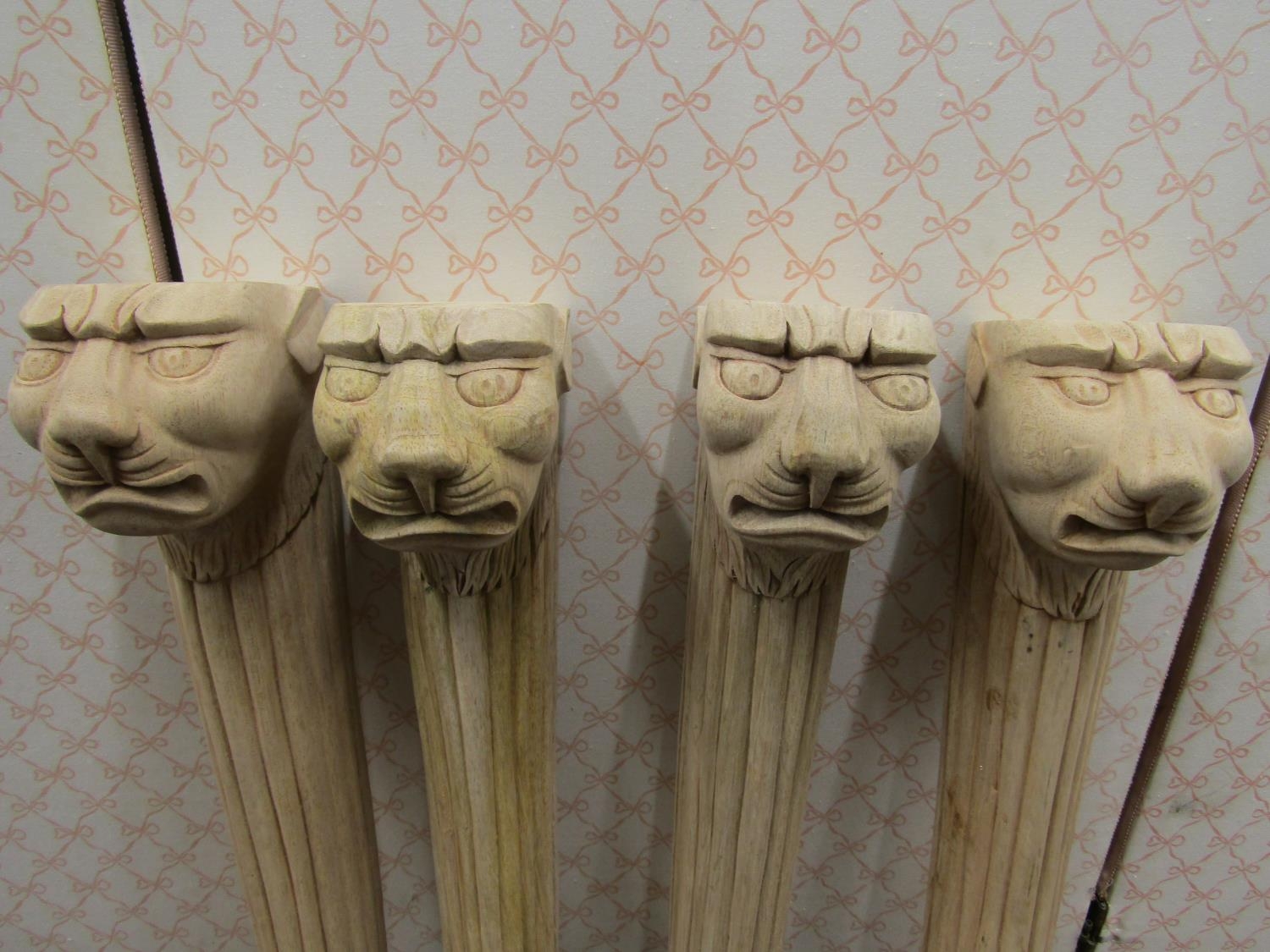 Four carved hardwood column supports with lion mask and lions paw feet, 58cm high - Image 3 of 4