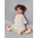 Early 20th century German bisque head character doll by Ernst Heubach for restoration, with bent