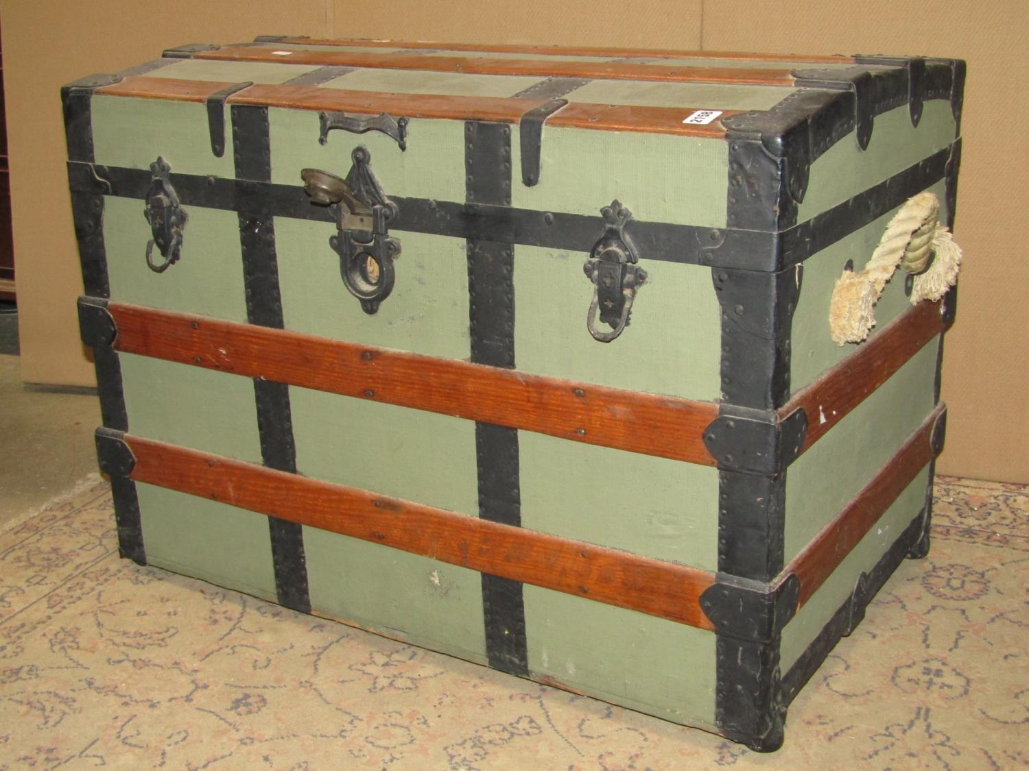 A vintage timber lathe and steel banded dome top cabin trunk 82 cm long x 52 cm wide x 59 cm high