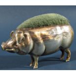 A silver pin cushion in the form of a pig, Birmingham 1905, maker Sydney & Co