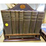 Houghton & Gunn reference library, eight small volumes housed in a miniature Edwardian mahogany