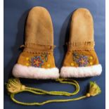 A pair of sheepskin mittens with long cuff and floral beading detail, North American Native style,