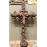 A weathered cast iron Crucifixion of Christ 107cm x 55cm