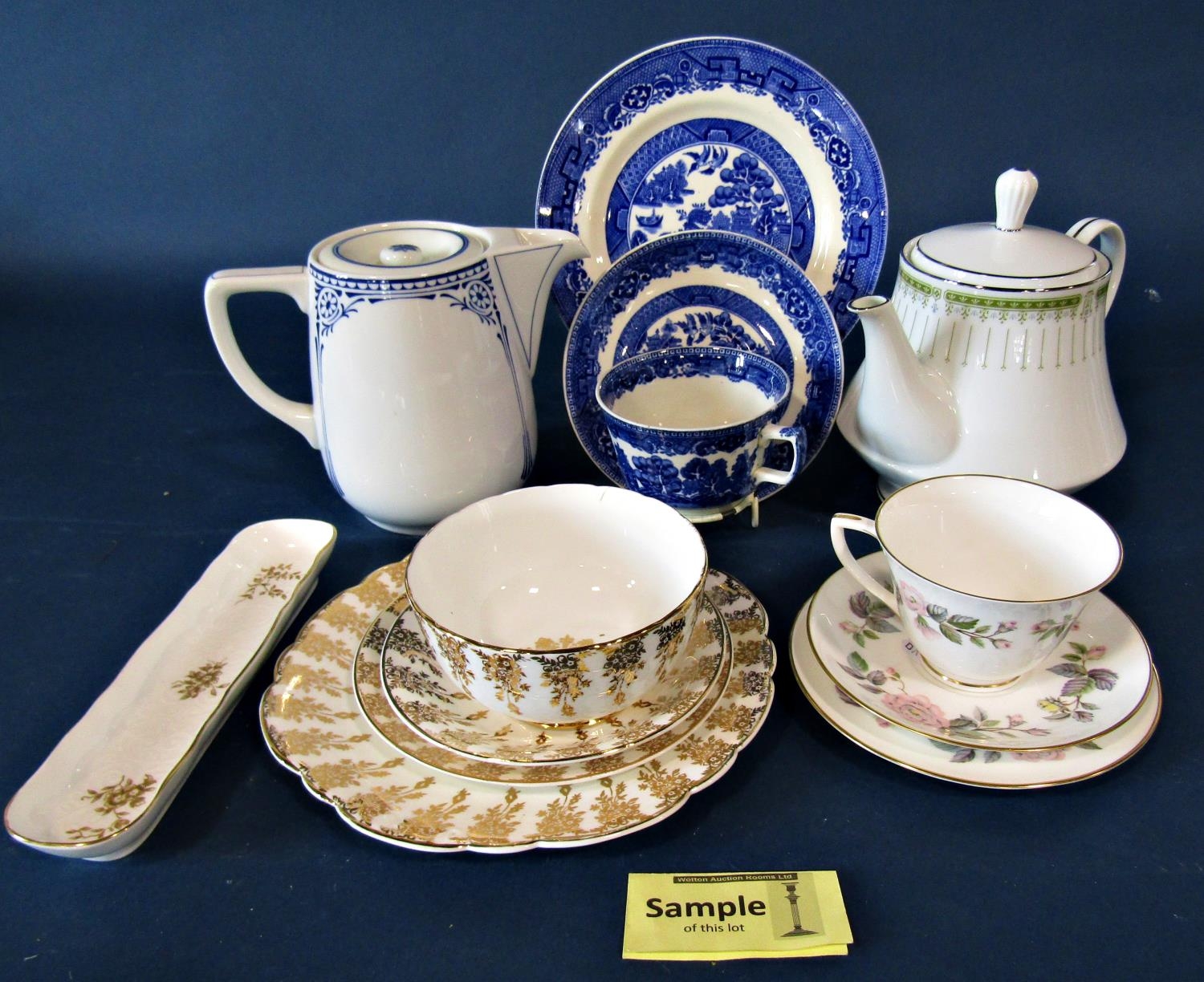 A collection of Willow pattern blue and white tea wares, a Luberne white and gilt collection of