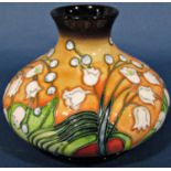 Moorcroft vase of squat circular form with white lily detail, limited edition 69/500, c. 2000