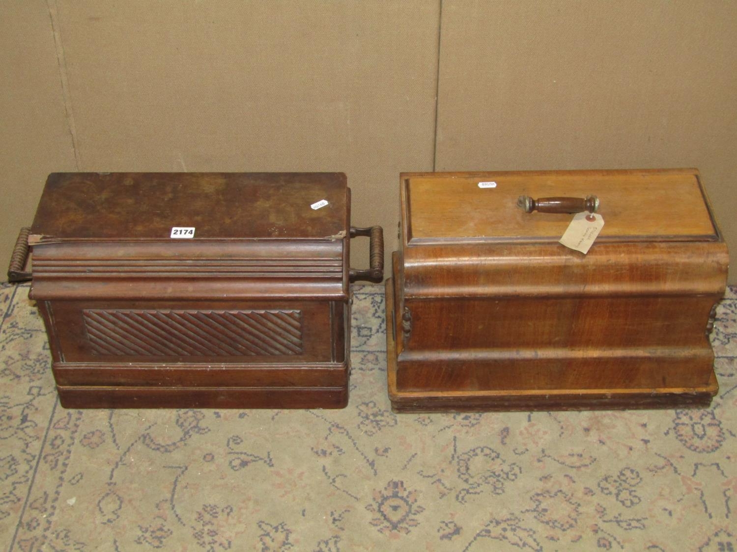 Two vintage portable cased sewing machines, Stoewer & Singer examples with decorative transfer