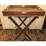 A Victorian mahogany rectangular butlers tray with folding frame