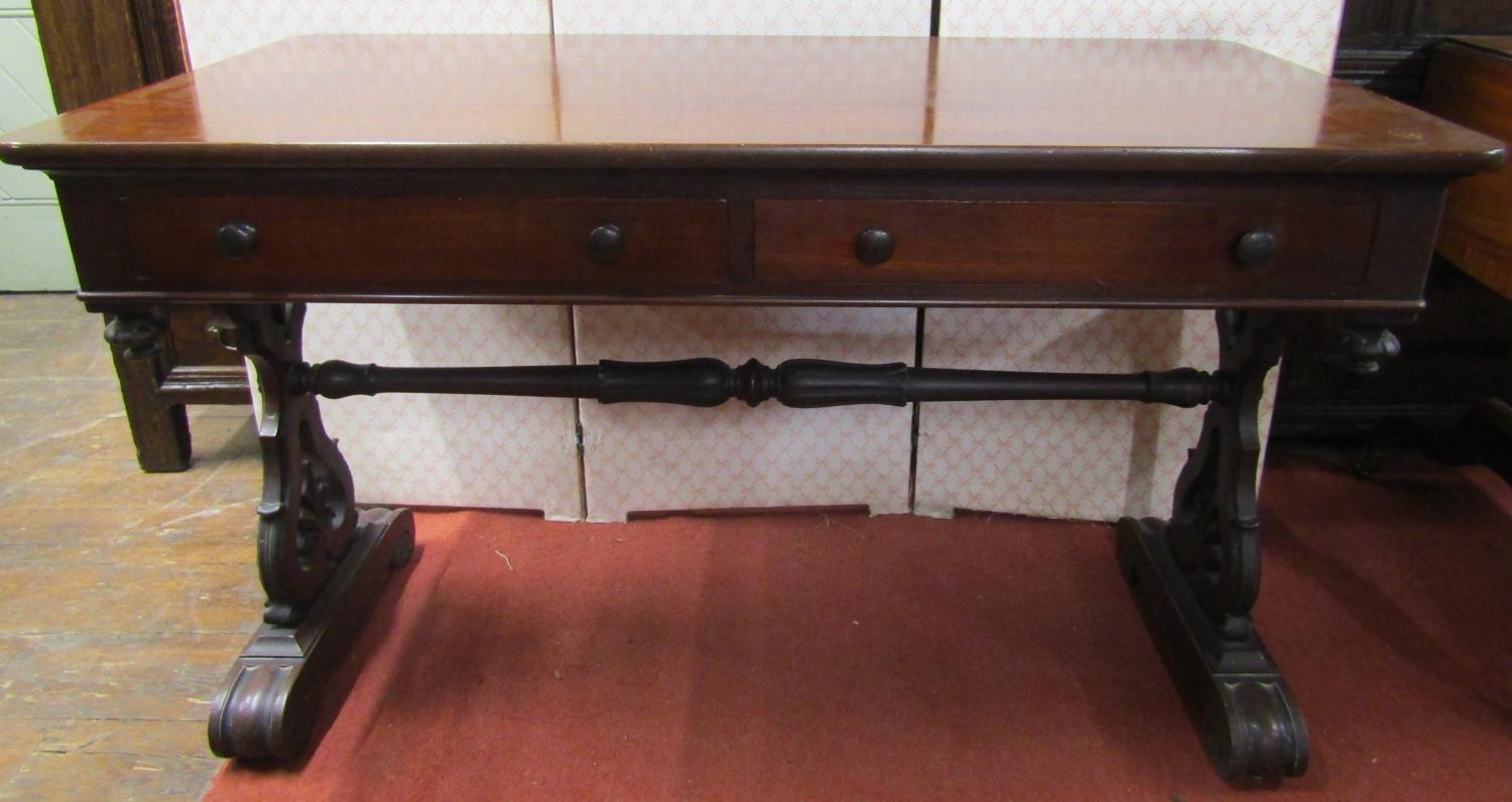 William IV mahogany library table fitted with two real and two dummy frieze drawers, stretcher