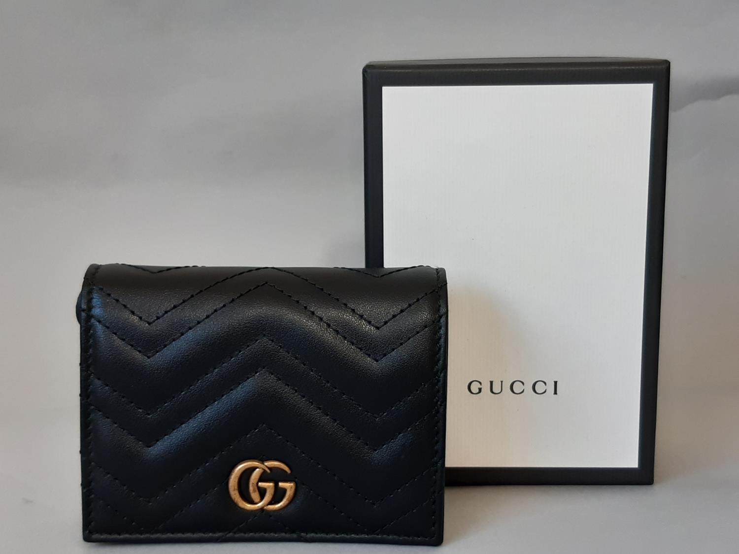 Marmont Card Case Wallet by Gucci (current style) in soft black leather with antique gold toned