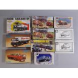 10 boxed model kits of haulage, recovery and emergency vehicles including kits by Airfix, Davric, JB
