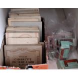 A collection of cigarette card albums and loose cards, mostly WD & HO Wills and John Player &