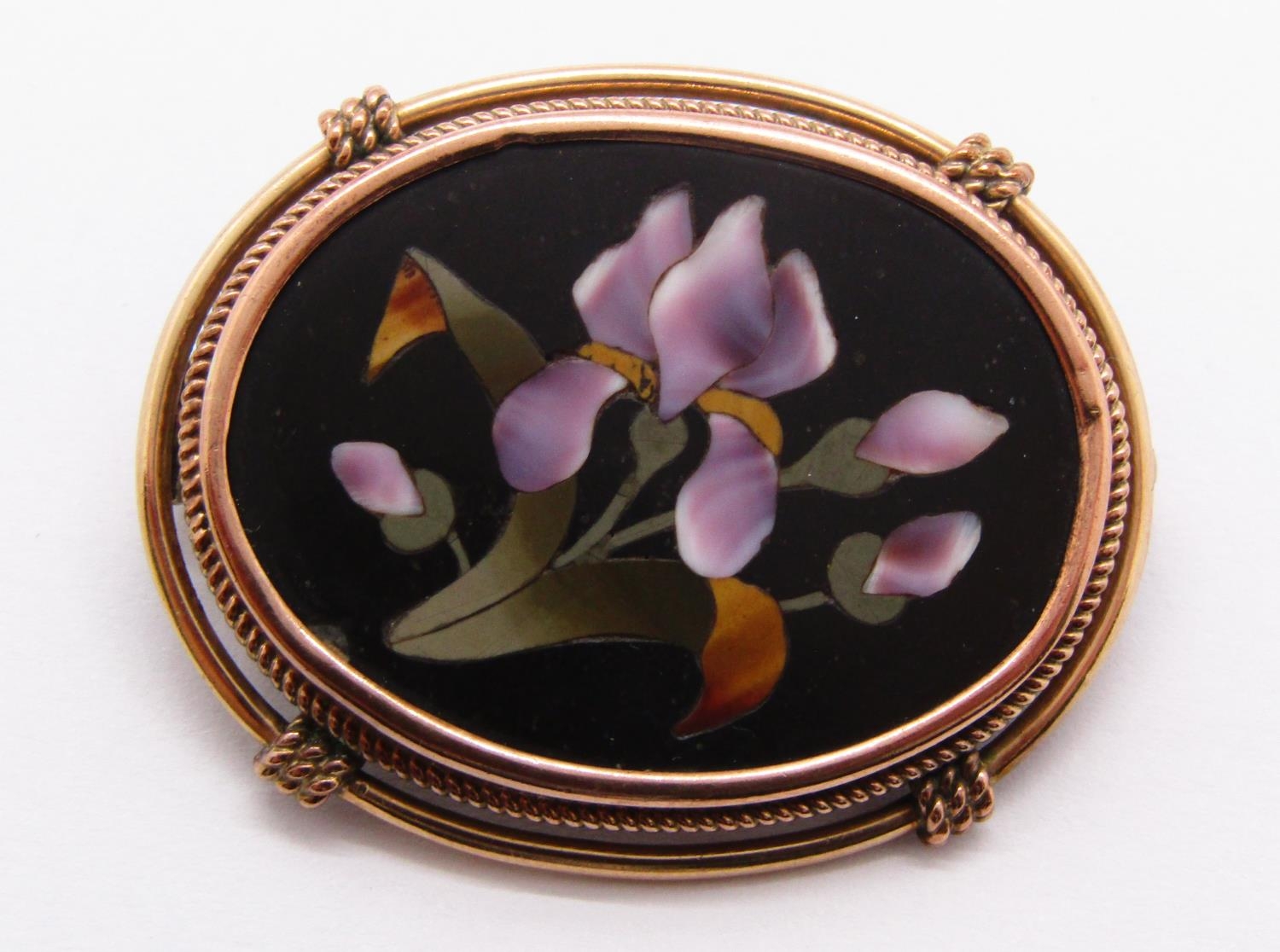 12k pietra dura brooch depicting a purple iris, 3.8cm W approx, 10.4g