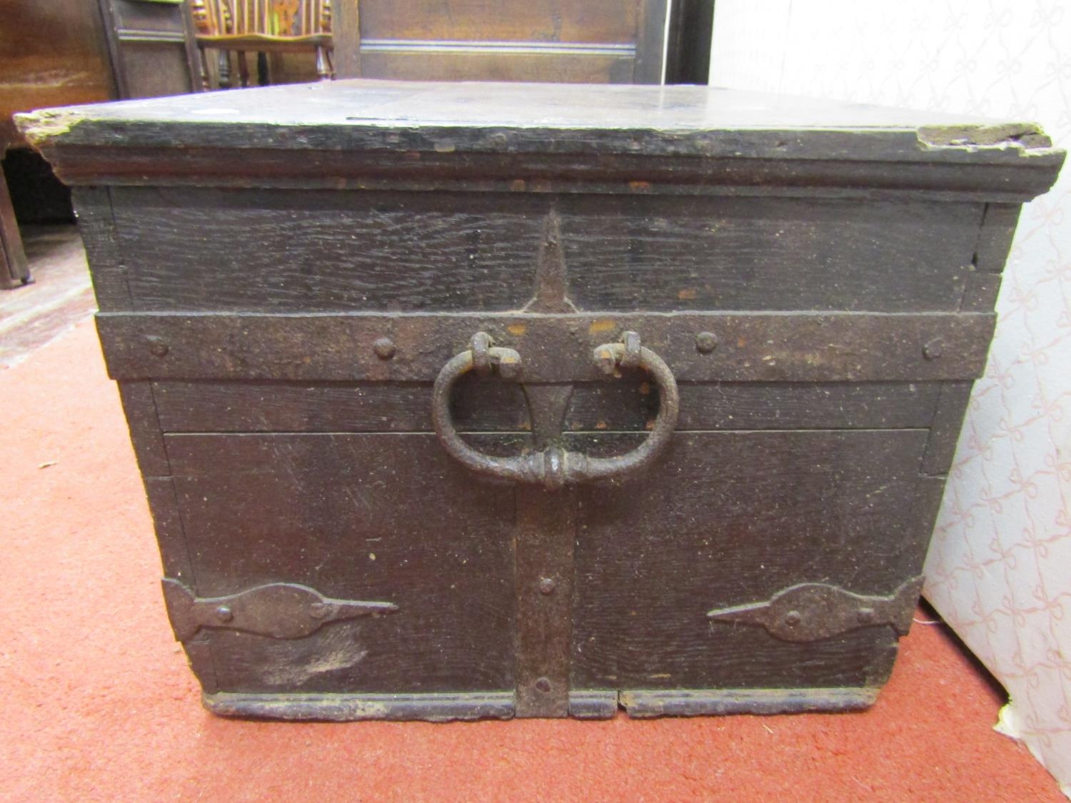 An early oak and iron bound strong box with carrying handles, 64cm wide x 43cm deep x 33cm high - Image 3 of 4