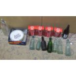 A small collection of vintage Stroud Brewery glass beer bottles, soda syphon, five limited edition