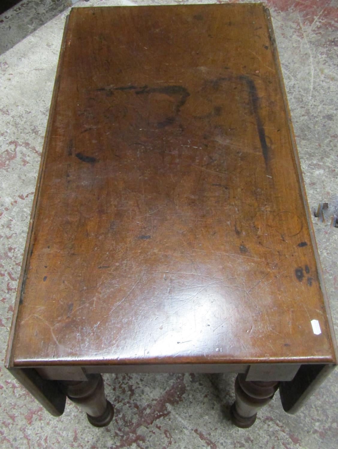 A 19th century mahogany drop leaf dining table on four turned supports, the top with swivel action - Image 2 of 6