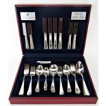 A complete canteen of Viners silver plated flatware for eight settings with beaded decoration to the