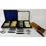 A large quantity of stainless steel and silver plated flatware in wooden canteens, boxed sets of